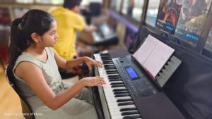 Dhriti Learning Keyboard and Vocals